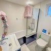 Photo 4: En Suite with bath and over head shower 