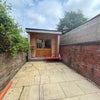 Photo 7: Patio area with shed 