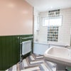 Photo 5: Communal toilet and bathroom