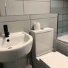 Photo 9: Fully tiled modern bathroom
