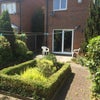 Photo 10: sunny private garden with table and chairs
