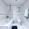 Photo 2: Gleaming Bathroom