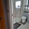 Photo 7: wider view of toilet entrance