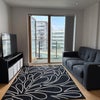 Photo 1: Living Room / Dining Area