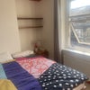 Photo 2: Master bedroom with king sized ottoman bed