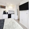 Photo 4: Fridge freezer, toaster, kettle, microwave and induction plug in hob provided.