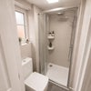 Photo 11: Downstairs shower