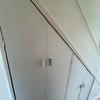 Photo 5: Extra storage under the stairs 