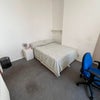 Photo 2:     Desk, wardrobe & storage