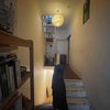 Photo 8: Hallway - first floor flat. The room is up the staircase.