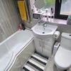 Photo 6: Shared bathroom.