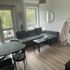 Photo 3: Living room: comes with a TV, sofa, and access to a balcony