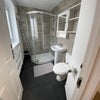 Photo 3: Shared shower between x3 (weekly cleaned)
