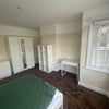 Photo 11: Larger front bedroom