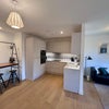 Photo 6: Mondern Kitchen + Breakfast Bar