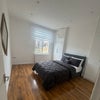Photo 2: Double bedroom with large window and radiator