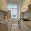 Photo 6: Separate kitchen with space for washing machine