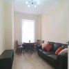 Photo 1: Shared Livingroom
