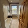 Photo 7: Private bathroom with bath and toilet