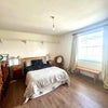 Photo 2: Queen bed (bedding not included)