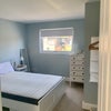 Photo 5: light and airy with blackout blind