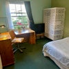 Photo 2: Double bed, wardrobe with shelves, desk chair, side table, chest of drawers and free view for TV