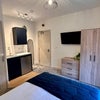 Photo 4: Bed 1 with Kitchenette & Ensuite