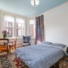 Photo 3: Bedroom with bed folded down