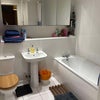 Photo 3: Toilet and Shower 