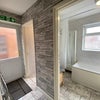 Photo 8: Toilet and bathroom corridor
