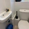 Photo 8: Toilet and sink 1