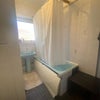 Photo 4: Shower/bathroom 