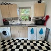 Photo 4: Kitchen with fridge freezer, WM & cooking