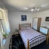 Photo 5: Bedroom with radiator & storage
