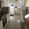 Photo 3: Kitchen in property has a slightly different layout.