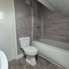Photo 4: Upstairs bathroom has a slightly different layout.