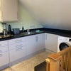Photo 6: Kitchen area with washing machine