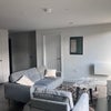 Photo 2: Living room, store, entryway 