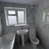 Photo 8: Shared bathroom