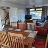 Photo 7: Living room. Dining area.