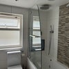 Photo 2: Shared bathroom for 2 double rooms