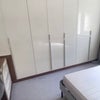 Photo 7: This is the double bedroom, with a larhe deak, two nightstands. Better pictures upon request