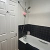 Photo 3: Good pressure from shower, adjusts height and head settings