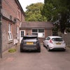 Photo 9: Main private entrance with parking & side entrance 