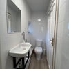 Photo 3: Sink & toilet with window 