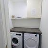 Photo 15: Shared laundry room
