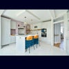 Photo 2: Kitchen area