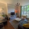 Photo 7: Living room with bay windows