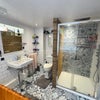 Photo 9: Roomate’s / guest bathroom for visitors