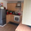 Photo 7: Part view of the kitchen